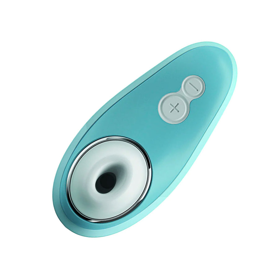 A Womanizer Liberty Clitoral Vibrator in Powder Blue is shown from the front against a blank background. It has two buttons.