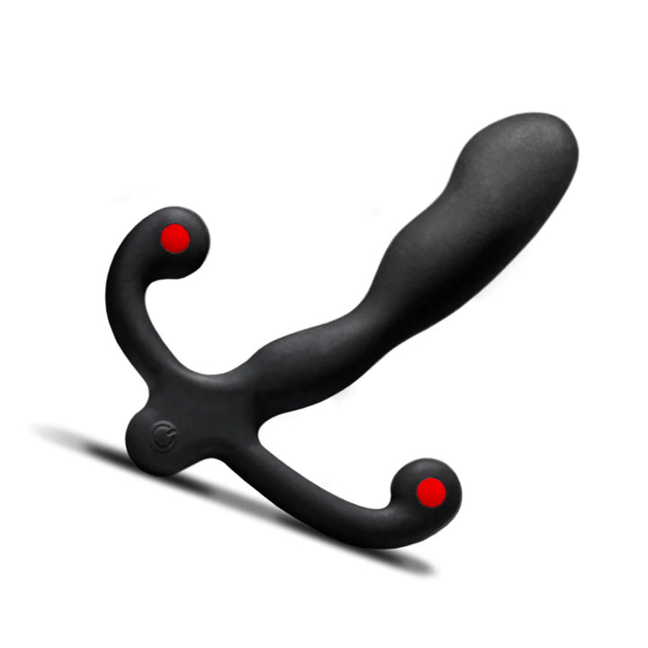 The Aneros Helix Syn V Vibrating Prostate Massager is shown against a blank background. The massager has bumps throughout and the base has two thin, curved arms, each with a red dot in the center.