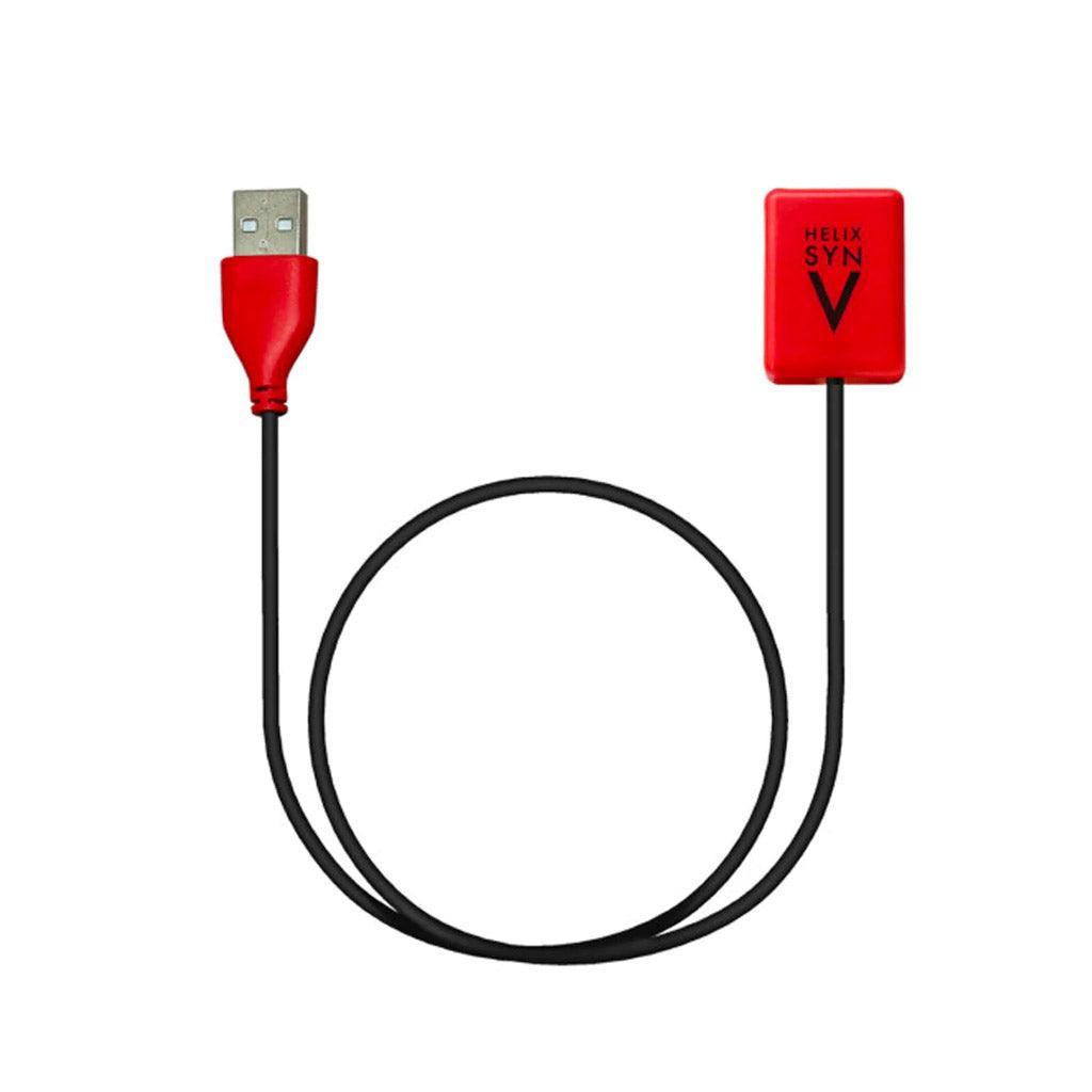 The charger for the Aneros Helix Syn V Vibrating Prostate Massager is shown against the blank background. The charger has a red magnet on one side, and a red USB port on the other.