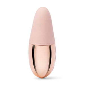 A Rose Gold Le Wand Chrome Double Vibe Rechargeable Vibrator is shown against a blank background.