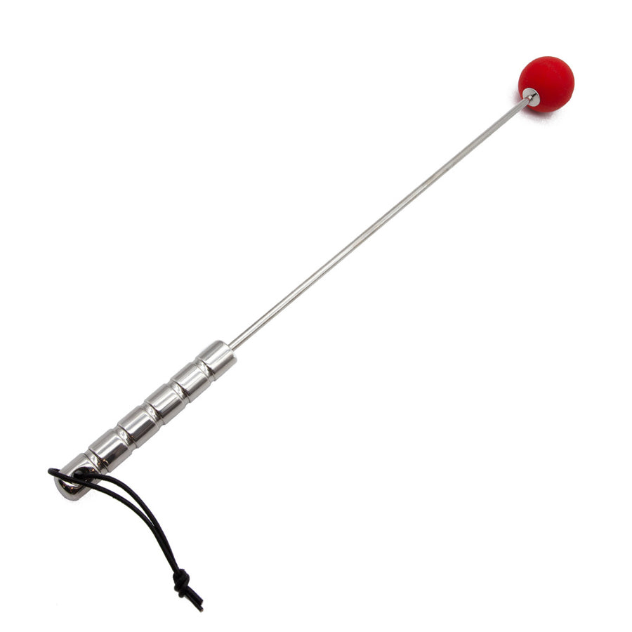The Red Silicone Ball Crop with a steel handle is shown against a blank background. The crop’s handle is a thick piece of silver steel with a wrist loop on the bottom. The body of the crop is a thin steel rod with a matte red silicone ball on the end.