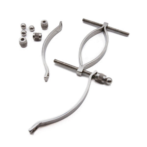 An image of the Stainless Steel Adjustable Pussy Clamp on a plain white background. The device is shown opened with the adjustable hardware pieces.
