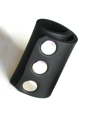 The small KinkLab Neoprene Ball Stretcher, a cylinder of black neoprene with metal snap closures, is displayed against a blank background.