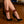 Load image into Gallery viewer, A close-up of a woman’s lower legs is shown. She is wearing black suede heels and JT Signature Collection Ankle Restraints and is standing on a wooden floor.

