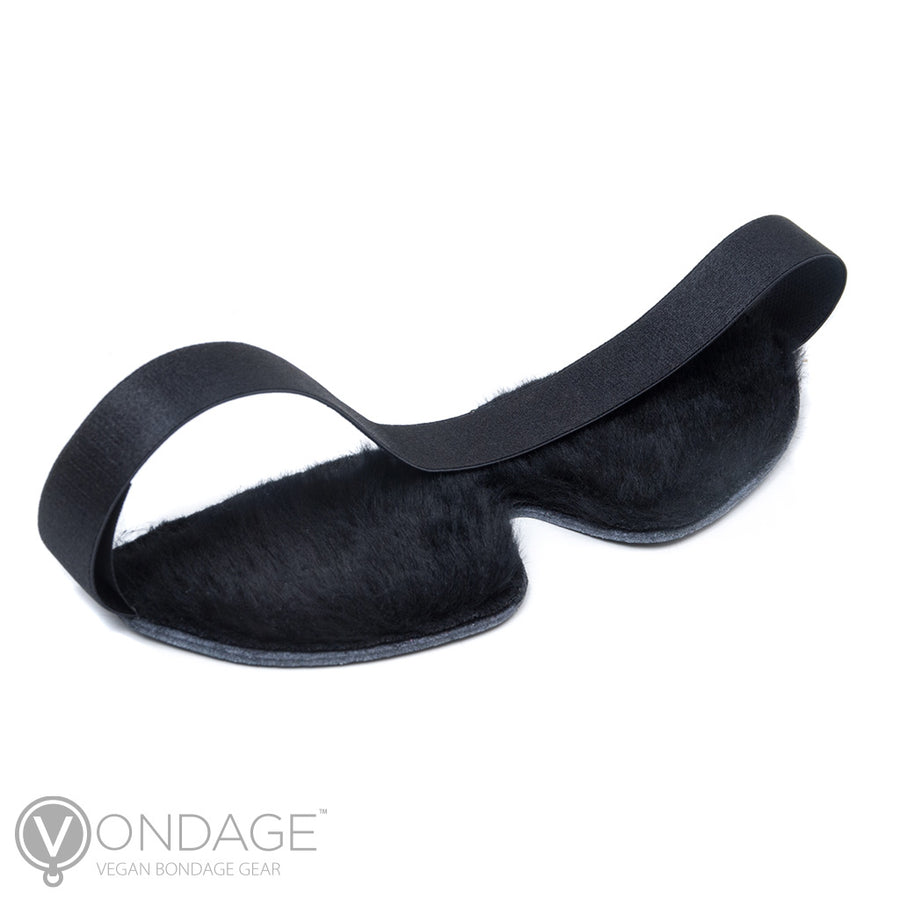 The Vondage Polyfleece-Lined Blindfold is displayed from the back against a blank background, showing that the inside of the blindfold is covered in fuzzy black fleece.
