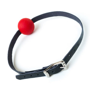 The Vondage Silicone Ball Gag is displayed from the back against a blank background, showing its silver metal buckle. The strap of the gag is adjustable.