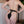 Load image into Gallery viewer, A nude woman is shown from the back wearing a Stockroom Black PVC Deluxe Female Chastity Belt.
