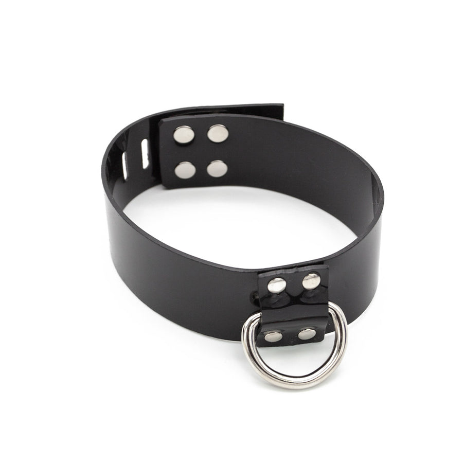 A buckled Stockroom Black PVC Collar with a D-Ring is shown against a blank background.