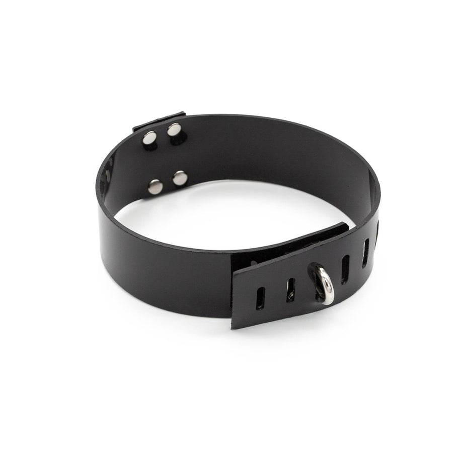 A buckled Stockroom Black PVC Collar with a D-Ring is shown against a blank background.