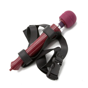 The Wand Thigh Harness made by The Stockroom is shown displayed with the KinkLab VibeRite Personal Wand Massager in front of a white background.