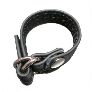 A Leather Cock Ring with D-Ring, Black made by The Stockroom and Stormy Leather is shown displayed in front of a white background.