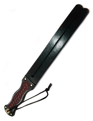 The English Tawse is displayed against a blank background. It has a thin wrist loop. 