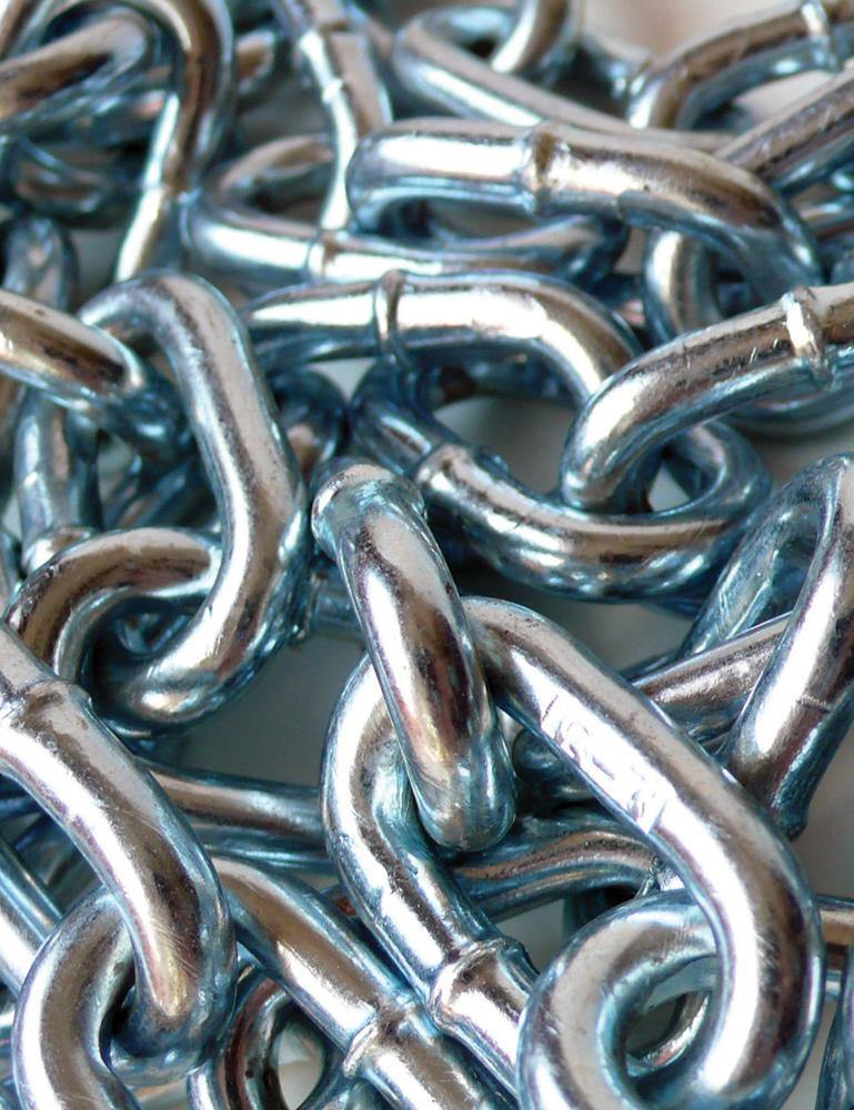 A close-up of a pile of Zinc-Plated Steel Chains is shown. The chains are silver. 
