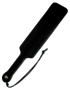 The Black Leather Fraternity Paddle is displayed against a blank background. It is rectangular-shaped with rounded corners with a wrist loop on the handle.
