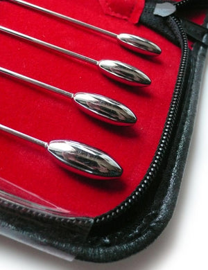 The tips of the four largest sounds from the 8 Piece Rosebud Urethral Sounds Kit are shown against the blank background.