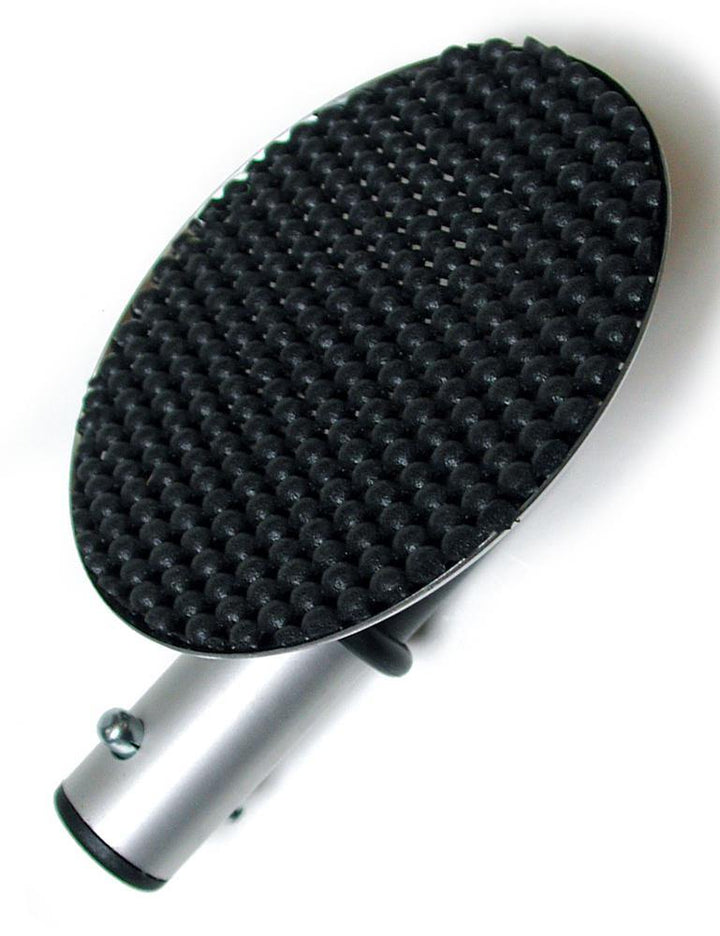 The Serving Tray Attachment For Scott Paul's Humiliator Gag, made of a round tray with a black rubber pad attached to a metal rod, is displayed against a blank background.