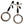 Load image into Gallery viewer, The Bully Nipple Clamps are displayed against a blank background. They are silver metal with black rubber tips, and each clamp has a large metal O-ring dangling from the bottom.
