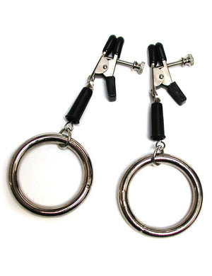 The Bully Nipple Clamps are displayed against a blank background. They are silver metal with black rubber tips, and each clamp has a large metal O-ring dangling from the bottom.