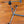 Load image into Gallery viewer, The lower half of the Stockroom Stockade, positioned on a wooden floor, is shown. There are twistable handles to adjust the depth of the fucking rod.
