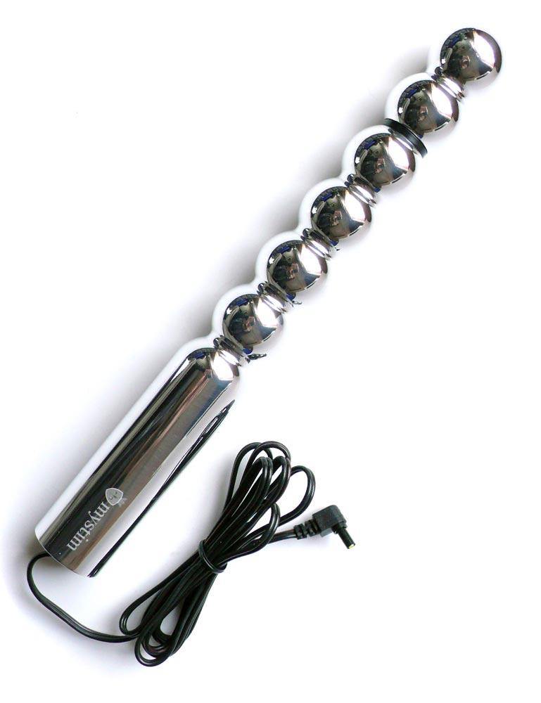 The Mystim Bal(L)Zac Balldildo is displayed against a blank background. It is a silver aluminum dildo that looks like six balls stacked on top of each other with a handle at the bottom.