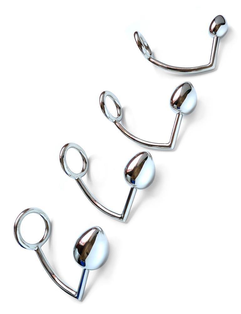  Four different-sized Trailer Hitch Kingpin anal plugs are displayed against a blank background from largest to smallest.