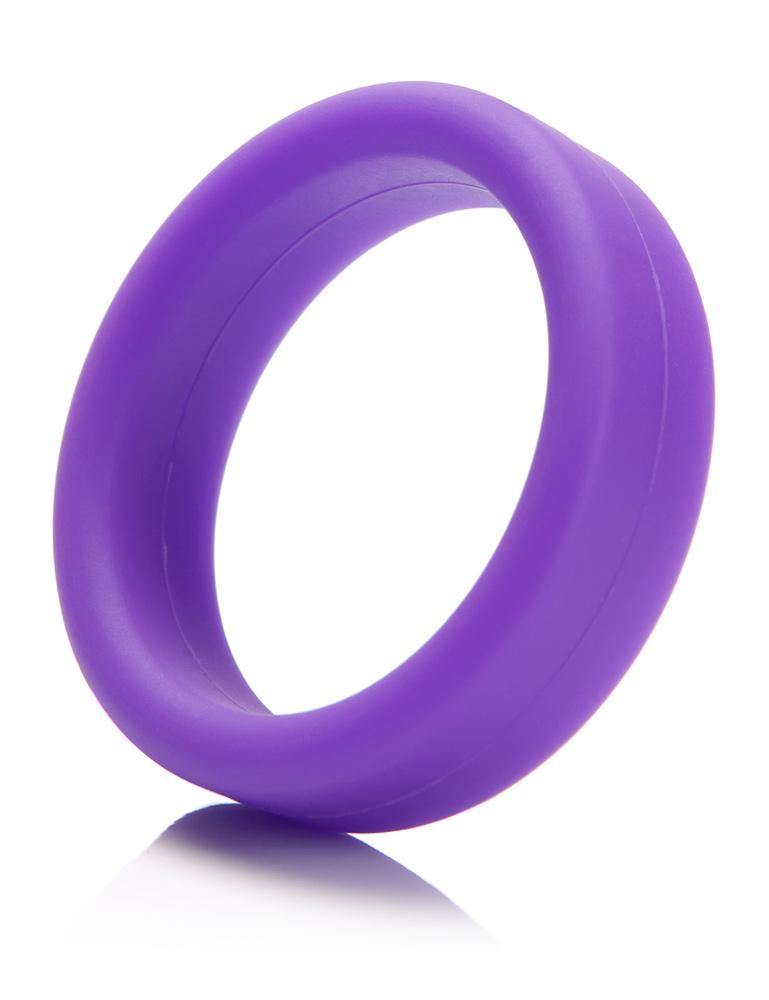 A Tantus Super Soft C-Ring in purple is displayed against a blank background. It is a ring made of a thick band of matte purple silicone.