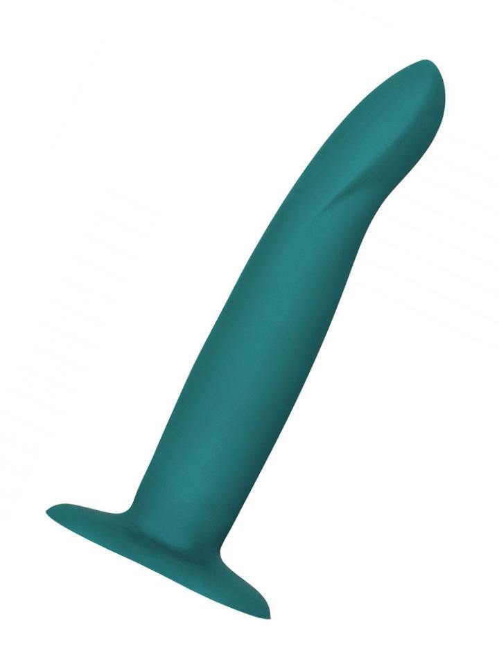 The Fun Factory Limba Flex Bendable Dildo in a size Medium is shown from the side against a blank background. The dildo is a dark teal and has a flat, extended base. It is very slightly tapered and has a mild curve beneath the head.