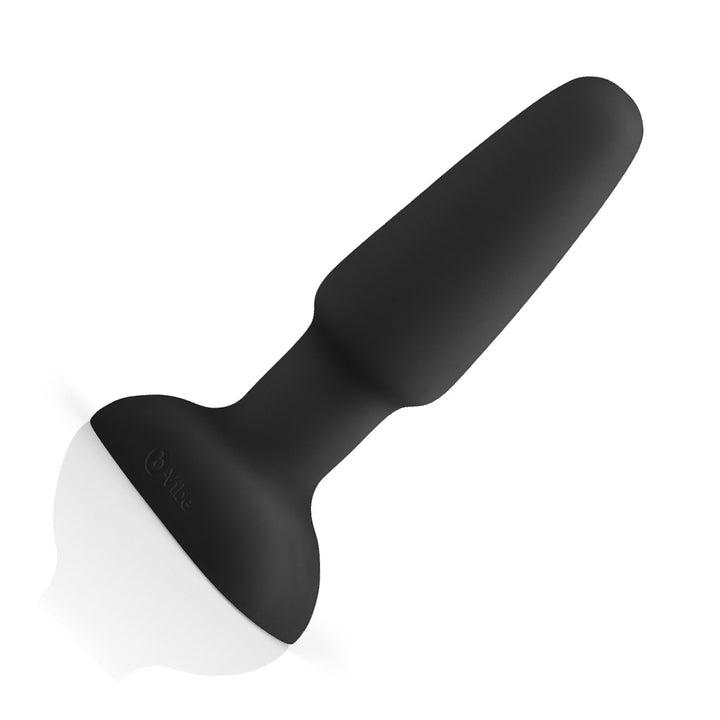 The Black B-Vibe Rimming Butt Plug 2 is displayed against a blank background. The plug is mildly tapered and has a slightly thinner neck and a wide base. It is made of matte black silicone.