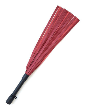 The Red Devil Leather Flogger By Dragontailz is displayed against a blank background. The flogger has falls that are dark red on one side and lighter red on the other, as well as a black handle.