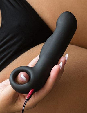 A close-up shows a woman holding the  Electrastim "Ovid" Silicone Noir Dildo near her vagina.