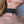 Load image into Gallery viewer, A close-up of the neck of a woman wearing the Silicone Locking Collar is shown.
