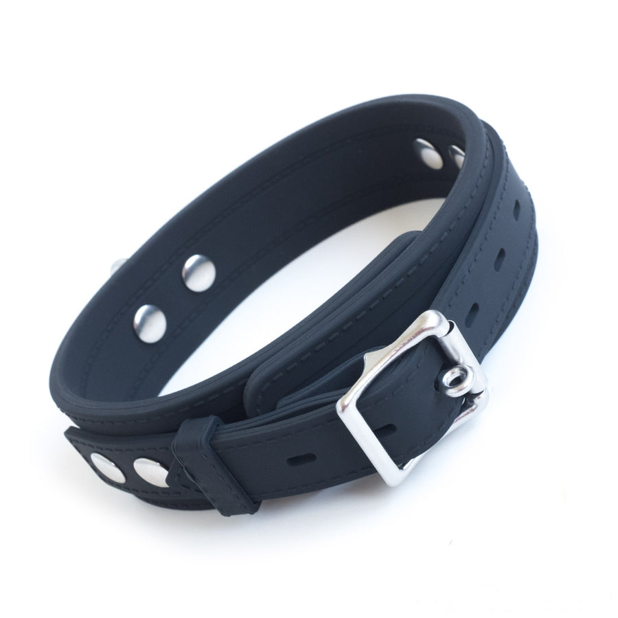 The Silicone Locking Collar is shown from the back against a blank background. The collar is adjustable and fastens with a lockable metal buckle.