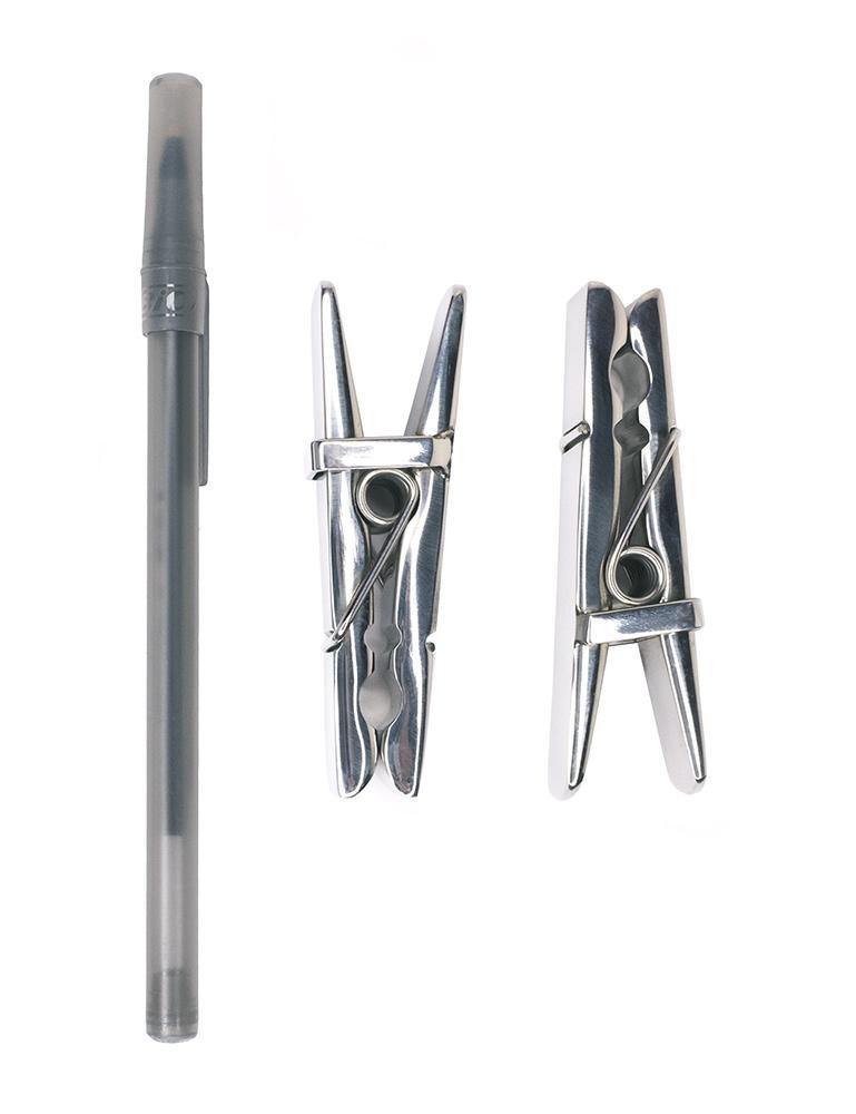 The Stainless Steel Clothespin Nipple Clamps are shown next to a black Bic pen against a blank background. The clamps are about half the size of the pen.