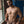 Load image into Gallery viewer, A nude man is shown standing in a room with brick walls and a dark blue swinging stall door. He is very muscular and has the Stainless Steel Clothespin Nipple Clamps on his nipples.
