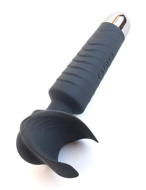 The Man Wand Silicone Vibrating Penis Masturbator is shown against a blank background. The wand is made of grey silicone with a silver end. It is shaped like a typical wand, but the head has a C-shaped indent with raised edges. 