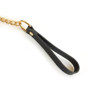 A close-up of the Brown Leather handle of the golden chain leash is shown against a blank background.
