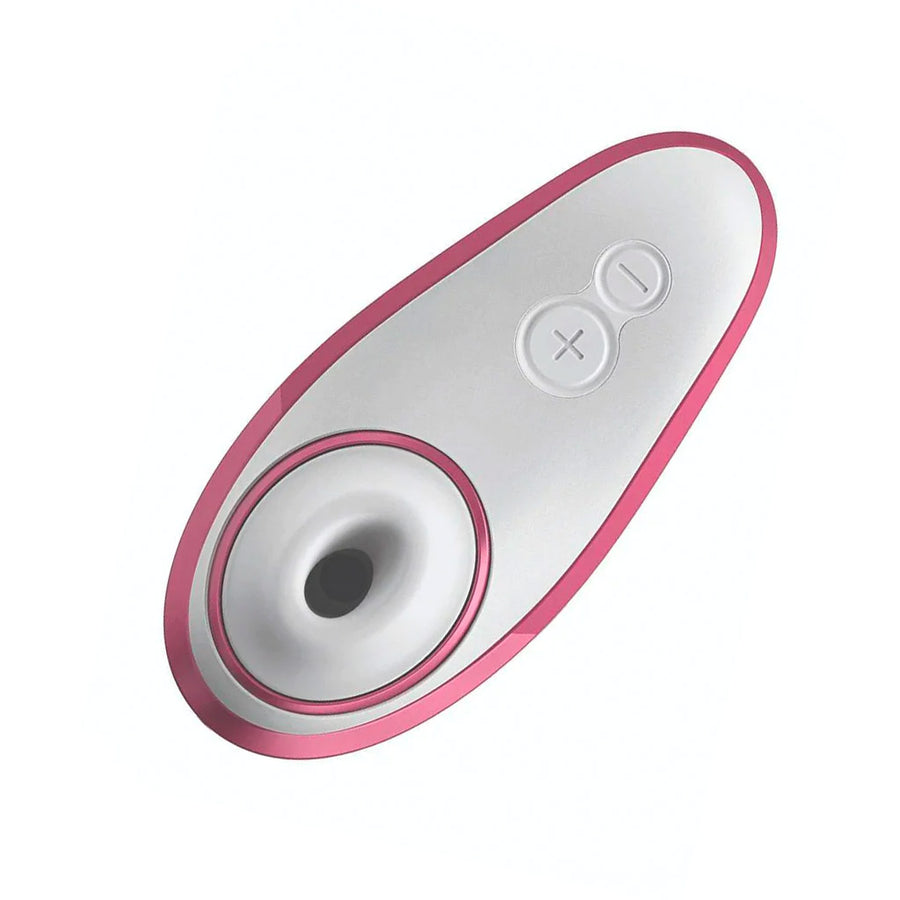A Womanizer Liberty Clitoral Vibrator in Rose Pink is shown from the front against a blank background. It has two buttons.