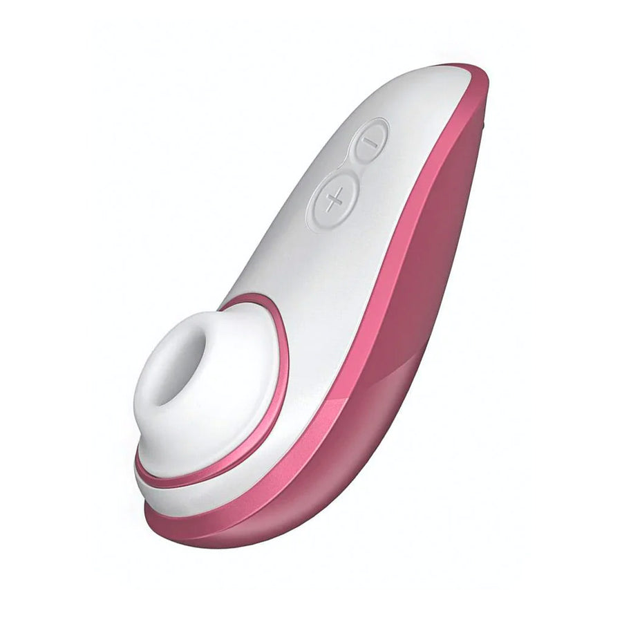 A Womanizer Liberty Clitoral Vibrator in Rose Pink is shown from the side against a blank background.