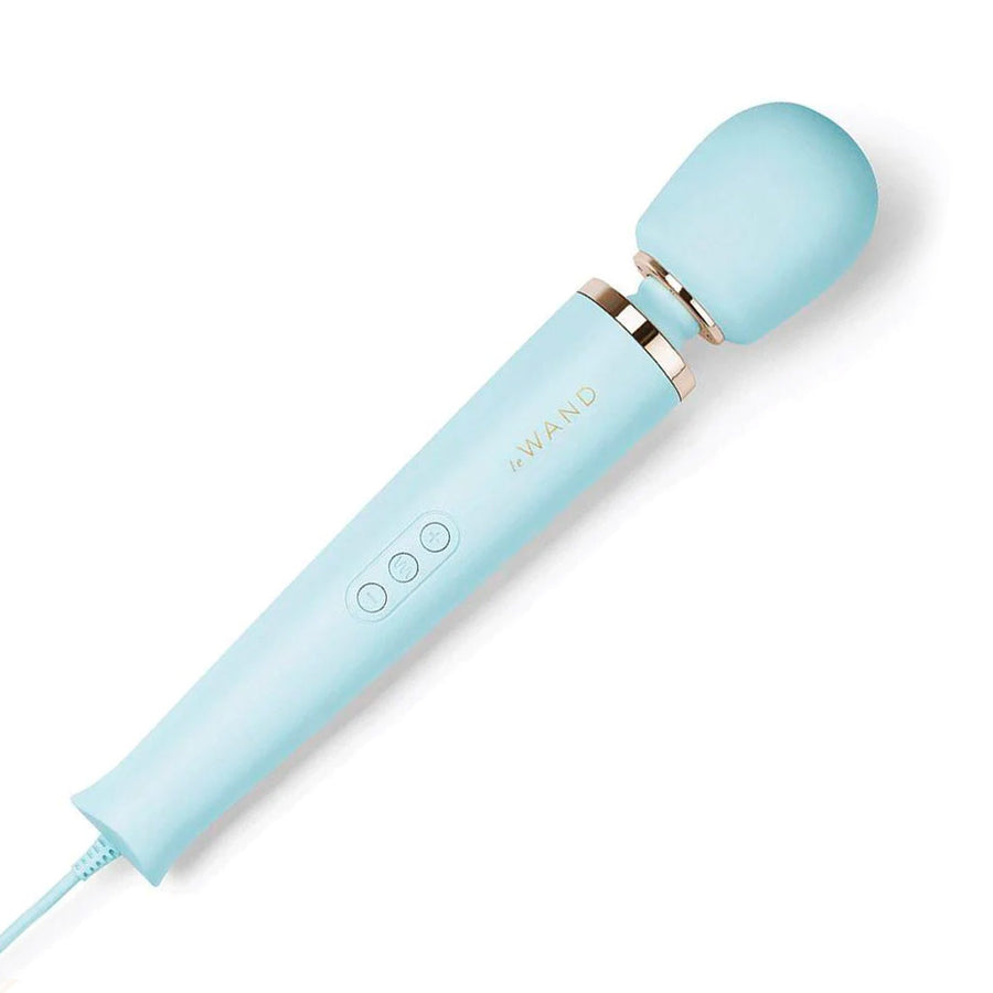 A Le Wand Plug-In Vibrating Massager in Sky Blue is shown against a blank background.
