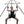 Load image into Gallery viewer, The Tetruss Portable Dungeon Deluxe Bundle is shown in use against a blank background. The spreader bar is connected to the frame, supporting a woman sitting in the leather slings. Her suspension wrist cuffs are attached to the spreader bar.
