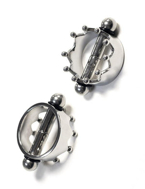 A pair of magnetic Nipple Crown Pinchers is displayed against a blank background. 