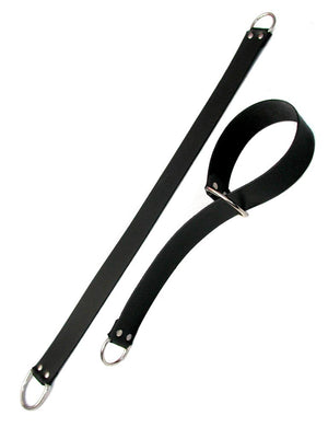 A pair of General Purpose Bondage Straps are shown against a blank background. They are wide strips of black leather with a metal D-ring on each end. One of the strips has been looped through one of the D-rings to create a cuff shape.