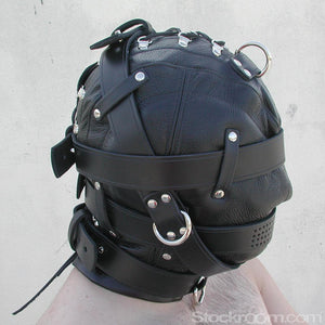 A person's head in the Heavy Duty Leather Hood is shown from the side. The straps that wrap around their head buckle behind their head. The hood laces up the back with black nylon laces.