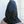 Load image into Gallery viewer, A man standing against a white wall is shown from behind, wearing the Leather Guillotine Hood. The base of the hood hits the top of his back. There is an adjustable drawstring cord near the base of the hood.
