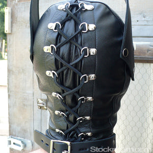 A close-up of the back of a man's head in the Leather Dog Hood with Snap-on Muzzle, Blindfold and Gag is shown. The hood laces up the back with black nylon laces and has an adjustable collar with a lockable buckle.