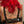 Load image into Gallery viewer, The back of a woman wearing Master G&#39;s Bondage Bra is shown. The back strap is made of black leather that is secured by a silver padlock, as are the shoulder straps.
