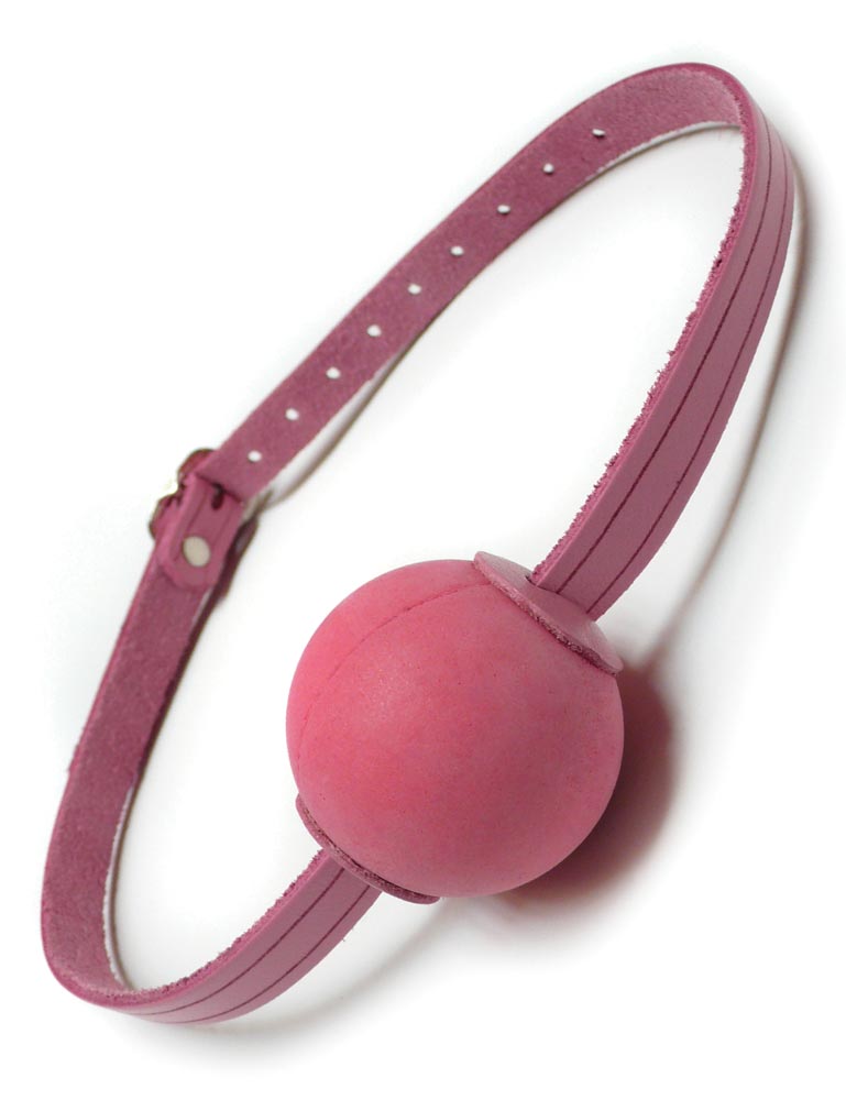 The Pink Ball Gag is shown against a blank background. It is made of a thin strip of light pink leather with a round, matte pink silicone ball in the center.