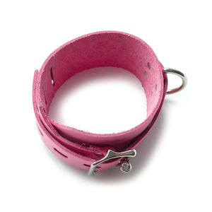 The Pink Leather Collar with Locking Buckle is shown from above against a blank background.
