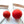 Load image into Gallery viewer, Two Medical Silicone Ball Gags of different sizes are shown against a blank background. A gag with a smaller ball is on the left, and a gag with a smaller ball is on the right.
