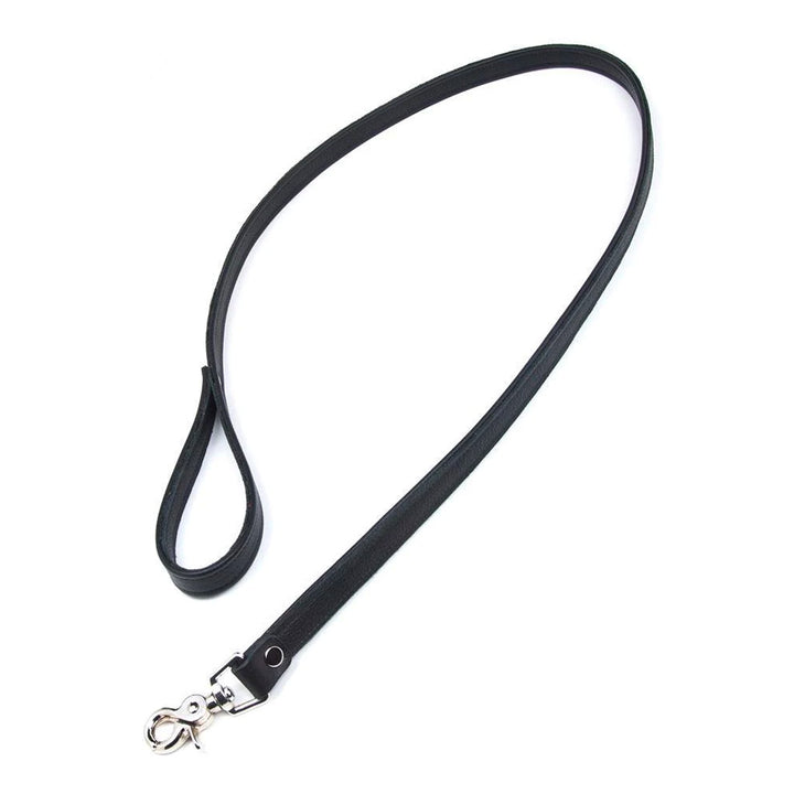 The black Premium Garment Leather Leash is shown against a blank background. It is a strip of black leather with a wrist loop on one end and a metal snap hook on the other.